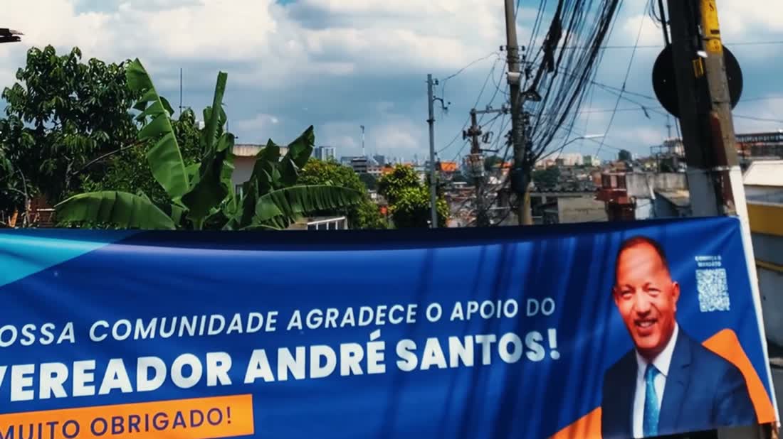 Faixa de agradecimento da comunidade